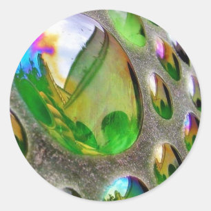 Sticker Rond Scupture vert reflète le verre