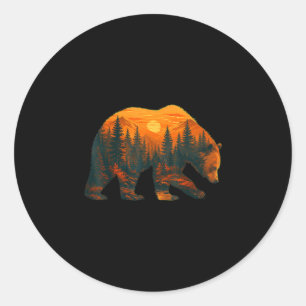 Sticker Rond Silhouette d'ours avec paysage forestier et couche