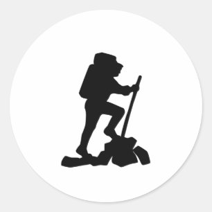 Sticker Rond silhouette noire de l'homme de montagne simple