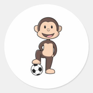 Sticker Rond Singe comme joueur de football avec balle de footb