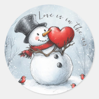 Sticker Rond Snowman offre l'amour avec un grand coeur