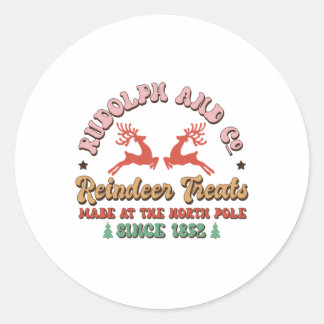 Sticker Rond Soins aux rennes de cadeau de Noël