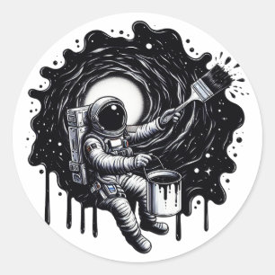 Sticker Rond Un astronaute peint l'univers