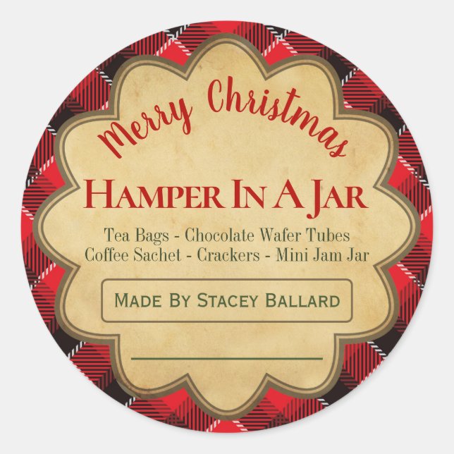 Sticker Rond Un Hamper De Noël Rouge Vert Écarté Dans Une Idée  (Devant)