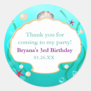 Sticker Rond Un petit coquillage assorti de La Petite Sirène co