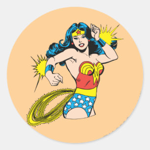 Sticker Rond Une femme se tortille avec des menottes brillantes