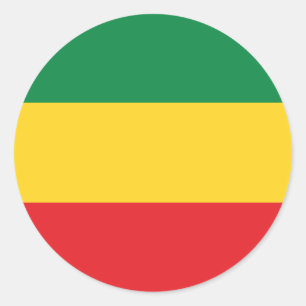 Sticker Rond Vert, or (jaune) et drapeau de couleurs rouges