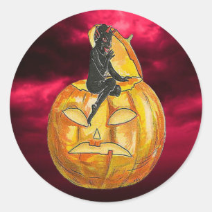 Sticker Rond Vintage diable noir sur Jack o' Lantern