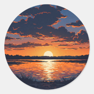 Sticker Rond Vue vibrante du coucher de soleil sur le lac orang