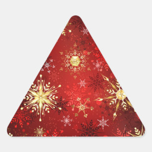 Sticker Triangulaire Noël Golden Snowflakes sur Arrière - plan rouge