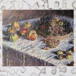 Still Life with Apples and Grapes by Claude Monet Jigsaw Puzzle<br><div class="desc">Still Life with Apples and Grapes (1880) by Claude Monet is a vintage impressionist fine art still life painting. Various fruits in a basket on a table including apples and grapes set for Thanksgiving dinner. About the artist: Claude Monet (1840-1926) was a founder of the French impressionist painting movement with...</div>
