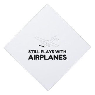 STILL PLAYS WITH AIRPLANES GRADUATION CAP TOPPER