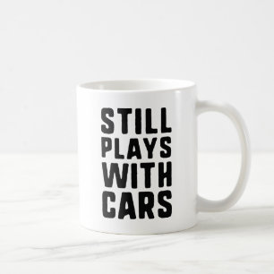Still Plays With Cars Coffee Mug