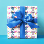 Stitch & Angel Christmas Pattern Wrapping Paper Sheet<br><div class="desc">Wrap your holiday gifts in Disney magic with this festive Lilo & Stitch wrapping paper. Featuring a charming Christmas pattern with Stitch and Angel,  these sheets add a special touch to your presents. Perfect for spreading holiday cheer to friends and family.</div>