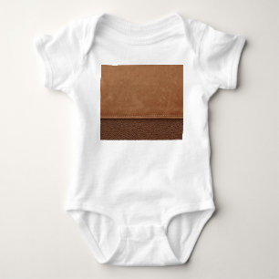 Stitched leather: grey, black background. baby bodysuit