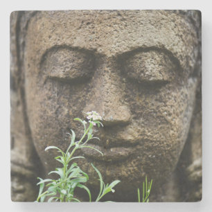Stone garden statue with flower coaster