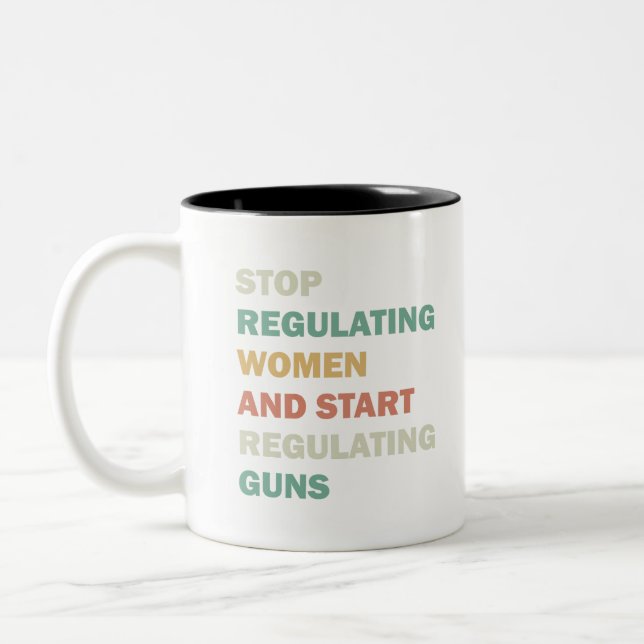 Stop regulating women and start regulating guns Two-Tone coffee mug (Left)