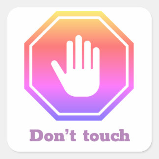 Stop sign with the expression “don’t touch” square sticker