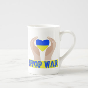 Stop war Ukrainian flag heart in hands Bone China Mug
