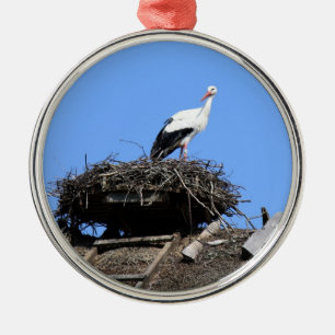 Stork on nest metal ornament