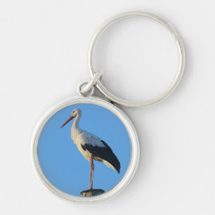 Stork on pole keychain