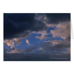 Storm clouds against blue sky