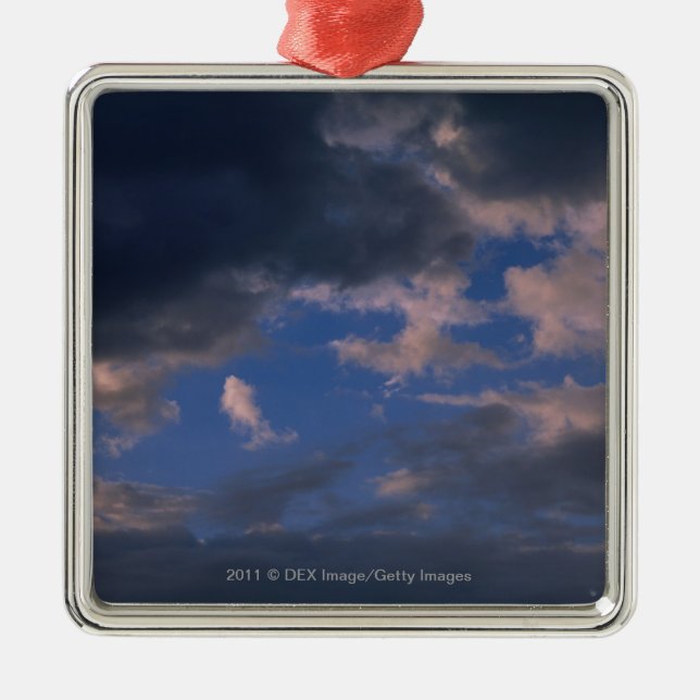 Storm clouds against blue sky metal ornament (Front)