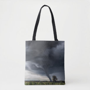 Storm tornado or twister lifing hay bales tote bag