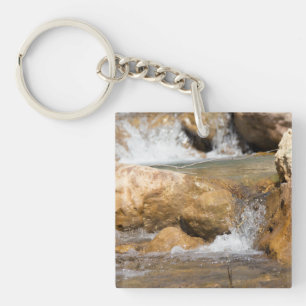 Stormy stream in spring keychain