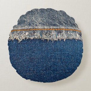 Straight stitch with orange thread on bleached den round pillow