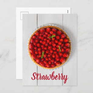 Strawberry cake with mint on white wood holiday postcard