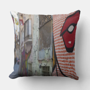 Street art on Calle de la Libertad street Throw Pillow