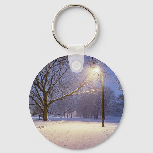 Street lights and covered in snow trees keychain (Front)