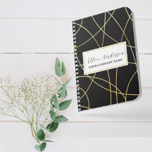 Striking Black Notebook with Metallic Accents  