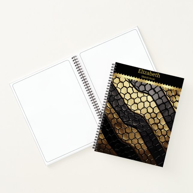 Striking patterns of a black and gold snake skin notebook (Inside)