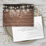 String Lights Rustic Wood Elegant Script Thank You Card<br><div class="desc">An elegant script thank you card featuring pretty string lights on a rustic wood background. You can personalize with your own thank you message on the reverse or if you would prefer to add your own handwritten message simply delete the text. A perfect way to say thank you! Designed by...</div>