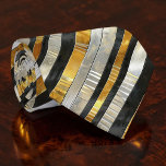 Striped Gold, Black, Silver Necktie<br><div class="desc">This stylish necktie features a classic striped pattern in rich gold, sophisticated black, and elegant silver. Perfect for adding a touch of modern flair to any outfit, whether it's for a business meeting, a special event, or simply to elevate your everyday look. The high-quality fabric ensures a comfortable and durable...</div>