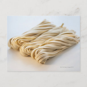 Studio shot of fresh linguini pasta postcard