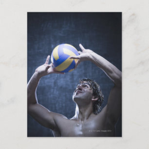 Studio shot of volleyball player playing postcard