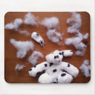 Stuffed dog brains mouse pad