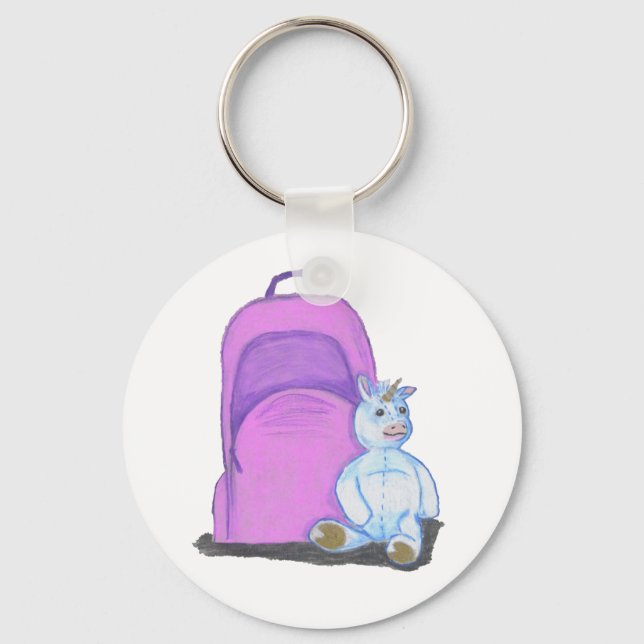 Stuffed Unicorn sits by a purple school Backpack Keychain (Front)
