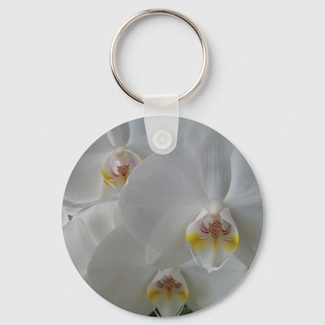 Stunning white orchids on a keychain (Front)