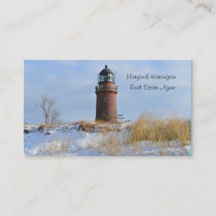 Sturdy Lighthouse on a Rocky Coast in Winter Business Card