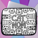 Stylish Cat Mom For Cat Lovers Laptop Sleeve<br><div class="desc">Protect your laptop in style with this adorable "Cat Mom" laptop sleeve, designed especially for proud cat enthusiasts! Featuring a delightful black and white design with playful cat illustrations encircling the bold text "Cat Mom, " this sleeve is both functional and fashionable. The intricate cat patterns and chic monochrome palette...</div>