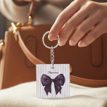 Stylish Lavender Stripes Purple Bow  Keychain<br><div class="desc">Embrace chic simplicity with this stylish acrylic keychain, showcasing a stunning deep purple bow centered on a backdrop of delicate lavender and white stripes. The name is elegantly presented in a classic font, adding a personal and refined touch to the design. This accessory is perfect for those who love a...</div>