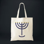 Stylish Menorah Navy Gold Tote Bag<br><div class="desc">Stylish Menorah Navy Gold tote. What a great idea for Sukkot! This handy tote features a stylish navy and gold Menorah. The golden Menorah is mentioned in the Bible in Exodus 25:31 ... it reads... And thou shalt make a candlestick of pure gold: of beaten work shall the candlestick be made:...</div>