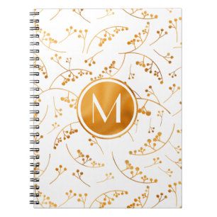 Stylish monogram gold berries pattern on white notebook