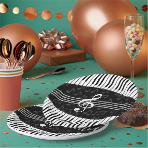 Stylish musical note clef and piano keys paper plate