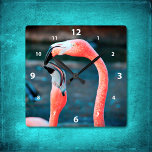 Stylish pink flamingo best friends photo modern square wall clock<br><div class="desc">Who says flamingos can’t have fun with their favourite pal? Enliven up your favourite room with this stunning, colourful photography wall clock of two flamingos playing around. Your choice of a round or square clock face. Makes a great housewarming gift! You can easily personalize this wall clock plus I also...</div>