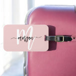 Stylish Pink World Traveller Monogram Name Luggage Tag<br><div class="desc">Travel in style with the Stylish Pink World Traveller Monogram Name Luggage Tag. This chic accessory is perfect for adding a personal touch to your luggage, featuring a modern pink design with a customizable monogram. Crafted from durable materials, this luggage tag is built to withstand the rigours of travel while...</div>
